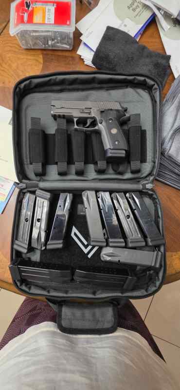 P229 legion with 11 extended mags